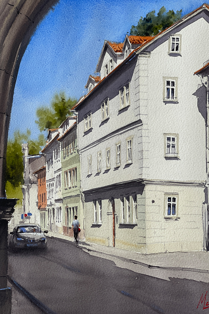 Aquarellgemälde einer Häuserreihe. Im Vordergrund ist ein Gebäude in Sandsteinfarben.